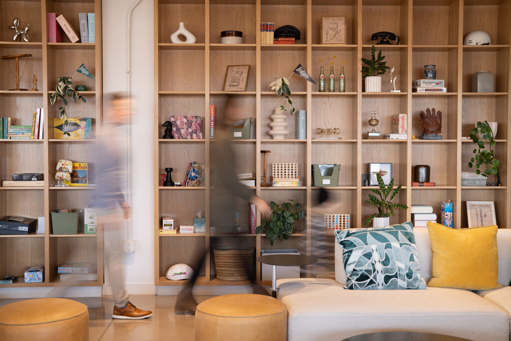 An interior view with movement of a public room in the Ledger in Bentonville, AR, the home office of Robbins Financial